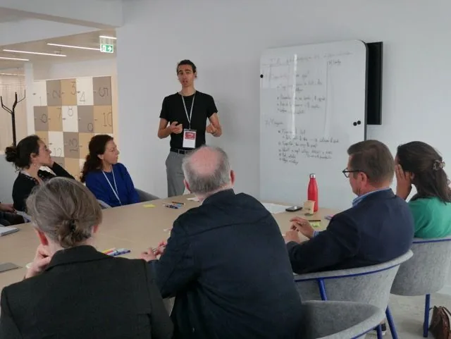 Atelier de formation à l'IA générative avec une équipe en entreprise
